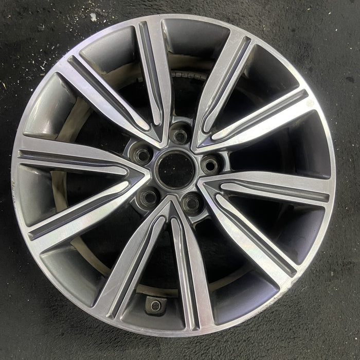 17" OPTIMA 19 17x7 , 10 spoke Original OEM Wheel Rim - Angle View