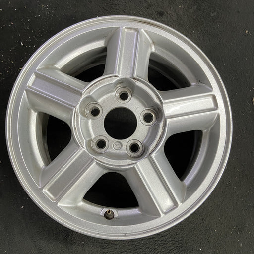 15" ESCAPE 01-04 15x6.5, , aluminum, grooved spokes Original OEM Wheel Rim - Angle View