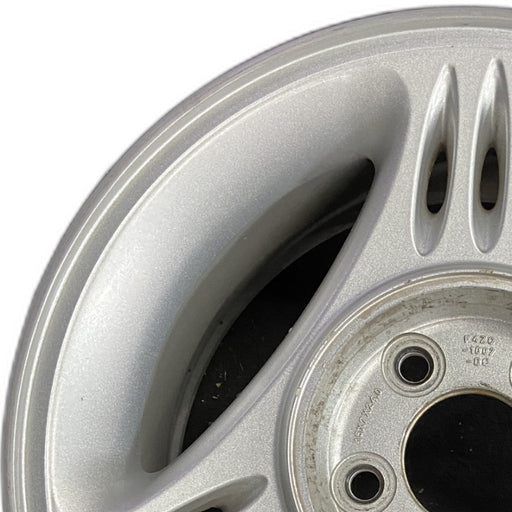 15" MUSTANG 94-95 15x7 w/o exposed lug nuts; w/center cap notch Original OEM - Angle View