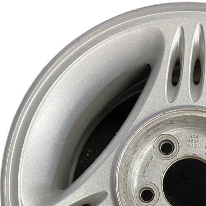 15" MUSTANG 94-95 15x7 w/o exposed lug nuts; w/center cap notch Original OEM - Angle View