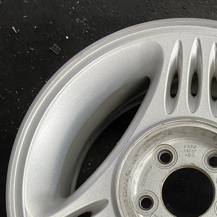 15" MUSTANG 94-95 15x7 w/o exposed lug nuts; w/center cap notch Original OEM - Side Profile