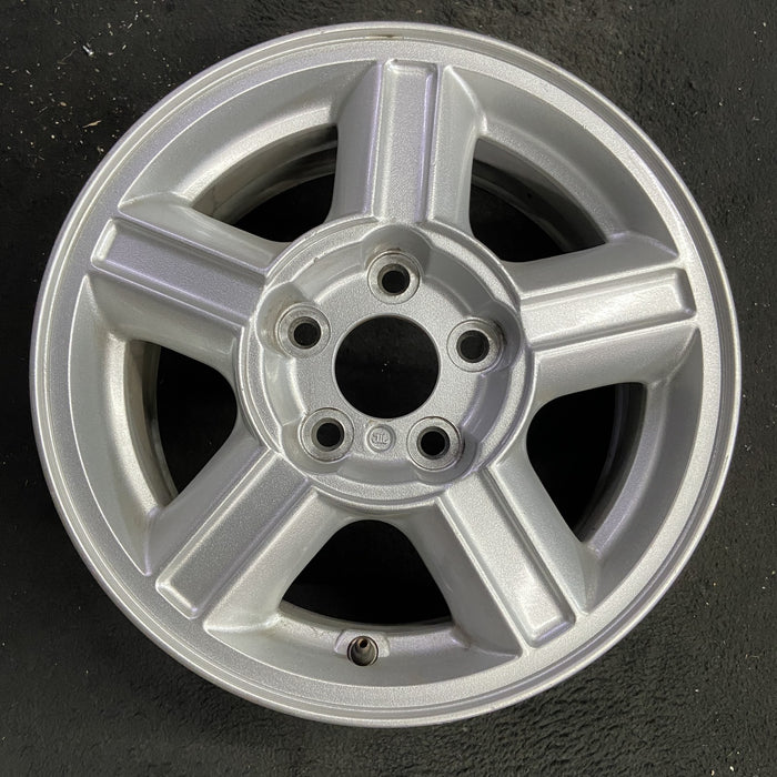 15" ESCAPE 01-04 15x6.5, , aluminum, grooved spokes Original OEM Wheel Rim - Angle View