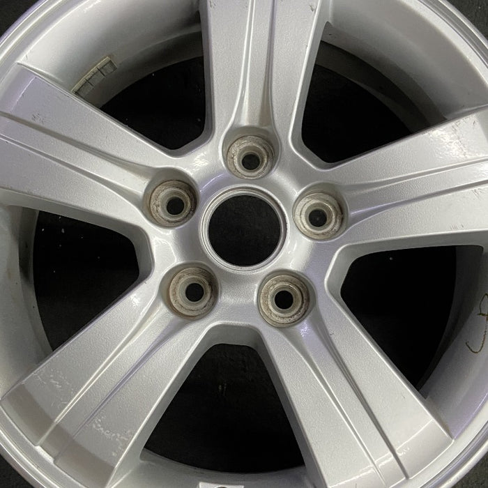 16" SPORTAGE 07-08 16x6.5 alloy 5 spoke ID 529101F350 Original OEM Wheel Rim - Angle View