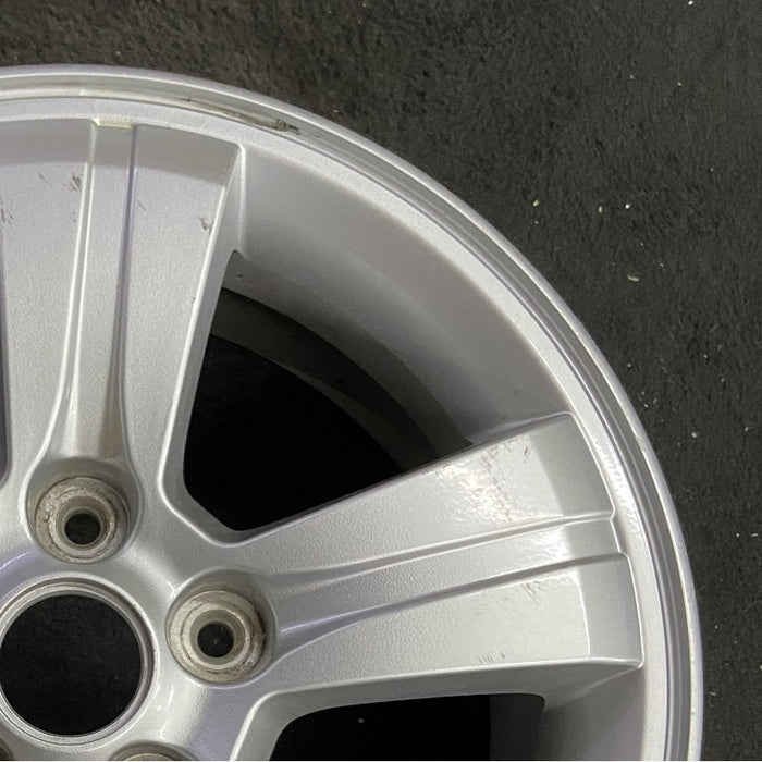 16" SPORTAGE 07-08 16x6.5 alloy 5 spoke ID 529101F350 Original OEM Wheel Rim - Close-Up Detail