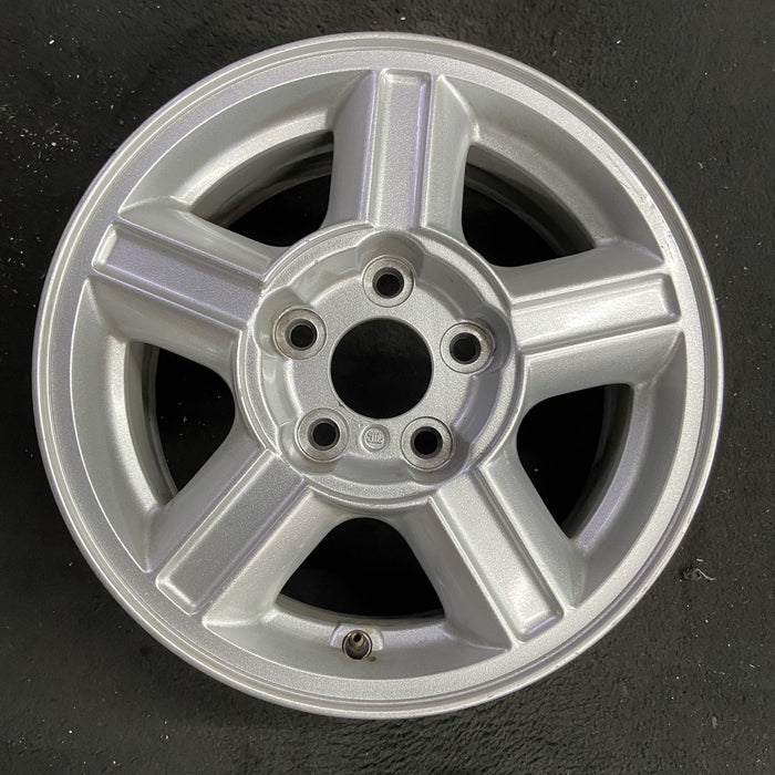15" ESCAPE 01-04 15x6.5, , aluminum, grooved spokes Original OEM Wheel Rim - Angle View