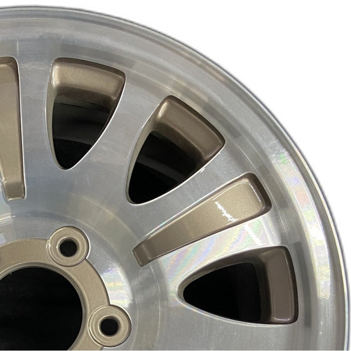 17" EXPEDITION 01-02 14mm lug 16mm hole 17x7.5 aluminum 10 triangular holes beige in pockets Original OEM Wheel Rim