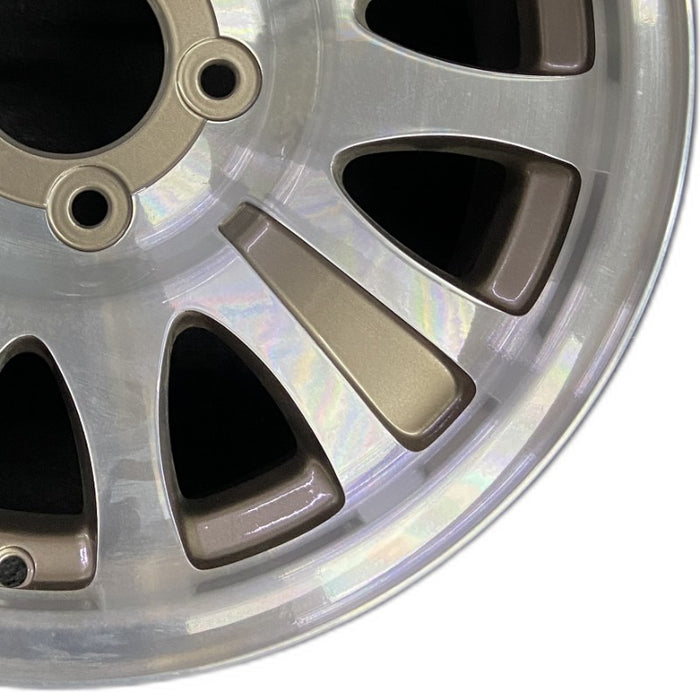 17" EXPEDITION 01-02 14mm lug 16mm hole 17x7.5 aluminum 10 triangular holes beige in pockets Original OEM Wheel Rim