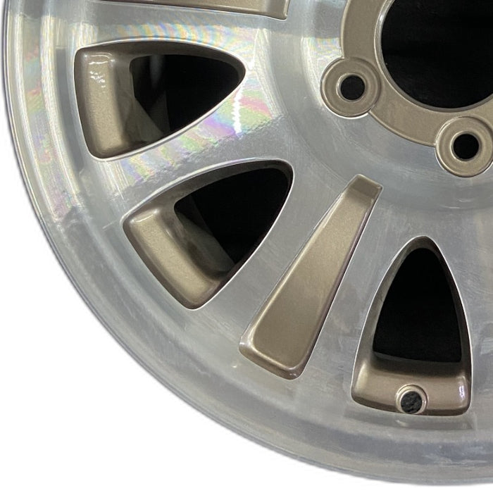 17" EXPEDITION 01-02 14mm lug 16mm hole 17x7.5 aluminum 10 triangular holes beige in pockets Original OEM Wheel Rim