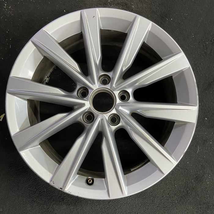17" BEETLE 17 17x7 , exposed lug nuts, 10 spoke, opt CL1 Original OEM Wheel Rim - Angle View