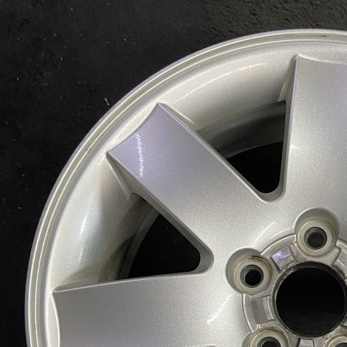 17" MONTEGO 05-07 17x7 7 spoke aluminum exposed lugs Original OEM Wheel Rim