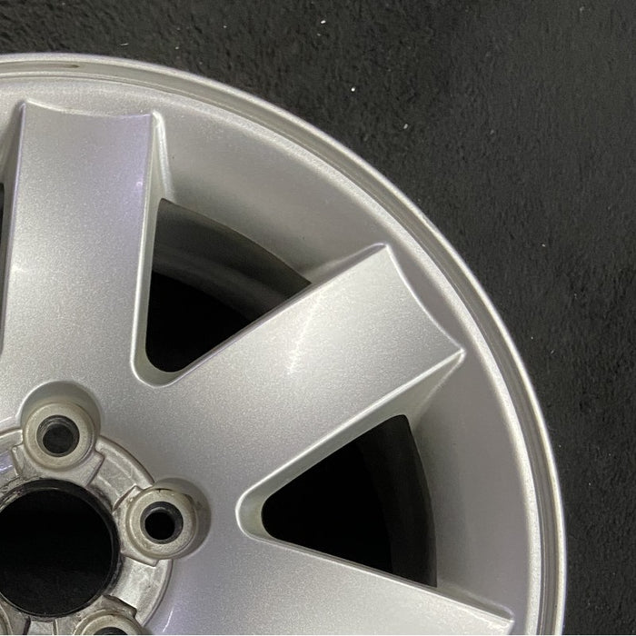 17" MONTEGO 05-07 17x7 7 spoke aluminum exposed lugs Original OEM Wheel Rim