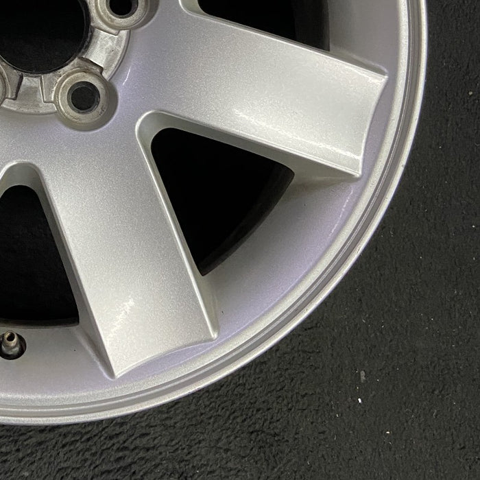 17" MONTEGO 05-07 17x7 7 spoke aluminum exposed lugs Original OEM Wheel Rim