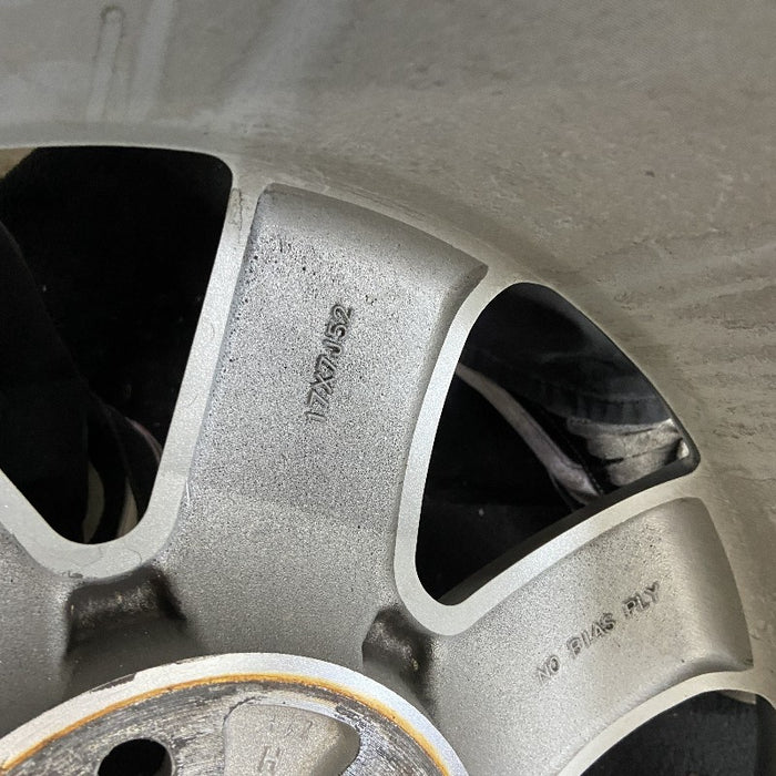 17" MONTEGO 05-07 17x7 7 spoke aluminum exposed lugs Original OEM Wheel Rim