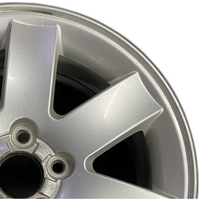 17" MONTEGO 05-07 17x7 7 spoke aluminum exposed lugs Original OEM Wheel Rim