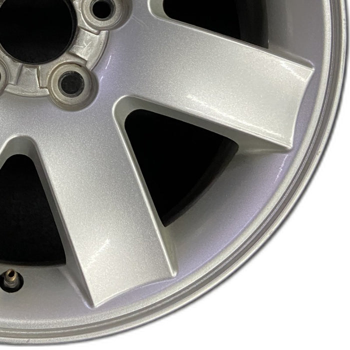 17" MONTEGO 05-07 17x7 7 spoke aluminum exposed lugs Original OEM Wheel Rim