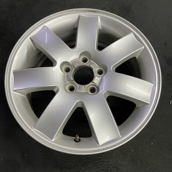 17" MONTEGO 05-07 17x7 7 spoke aluminum exposed lugs Original OEM Wheel Rim