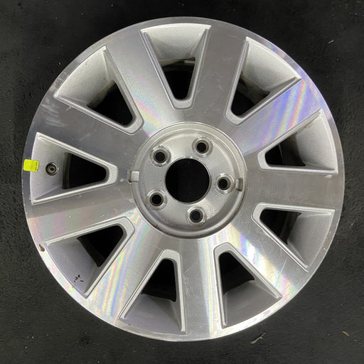 17" LINCOLN & TOWN CAR 03 17x7, 9 spoke, Original OEM Wheel Rim - Angle View