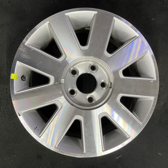 17" LINCOLN & TOWN CAR 03 17x7, 9 spoke, Original OEM Wheel Rim - Angle View
