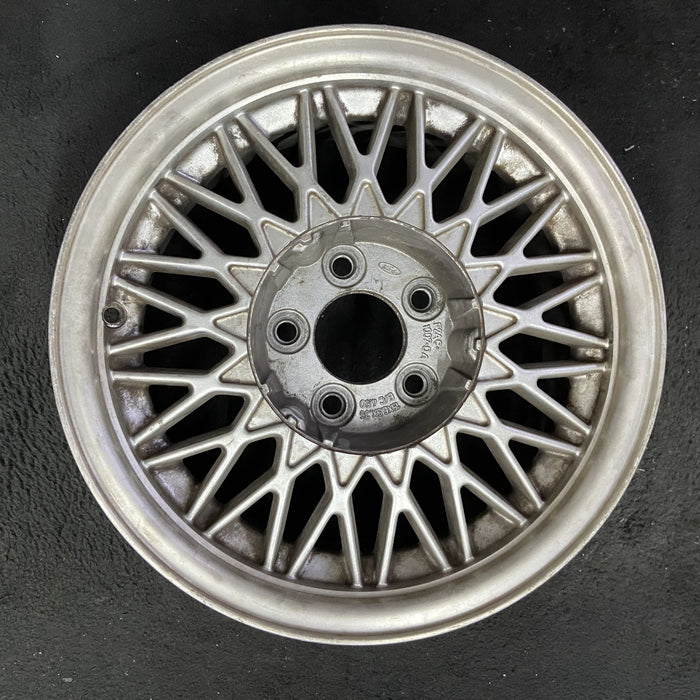 15" COUGAR 95-96 15x6.5 , 34 spoke Original OEM Wheel Rim - Angle View