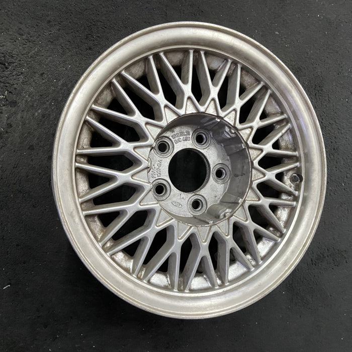 15" COUGAR 95-96 15x6.5 , 34 spoke Original OEM Wheel Rim - Close-Up Detail
