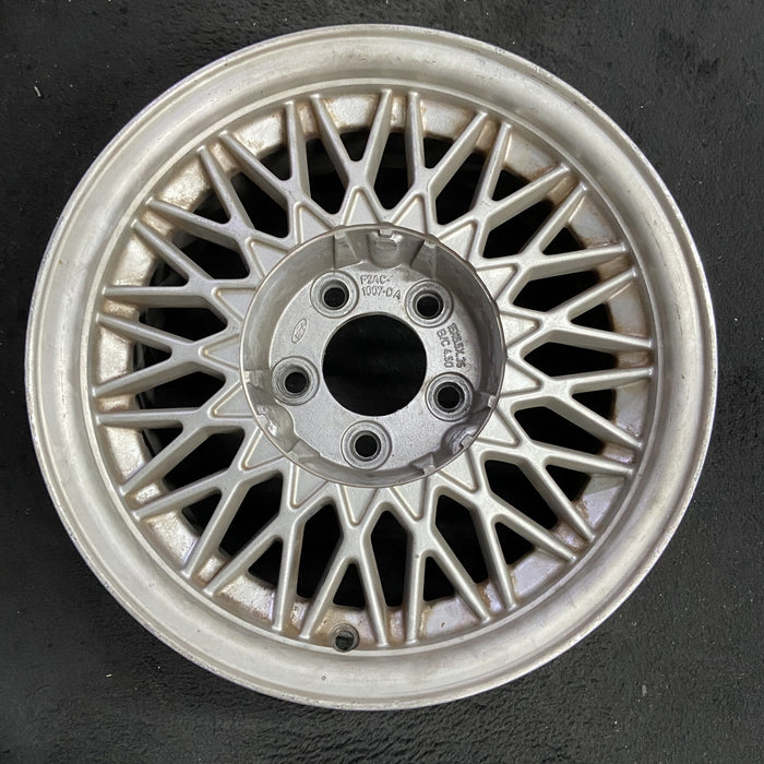 15" COUGAR 95-96 15x6.5 , 34 spoke Original OEM Wheel Rim - Angle View