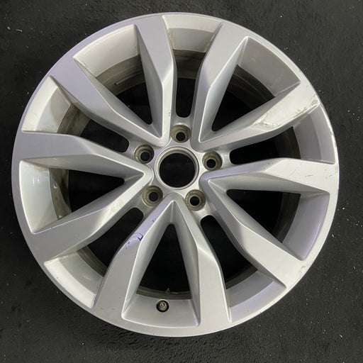 17" BEETLE 13-16 17x7 , exposed lug nuts, Original OEM Wheel Rim - Angle View