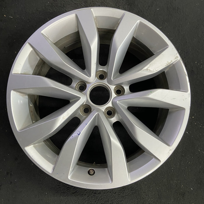 17" BEETLE 13-16 17x7 , exposed lug nuts, Original OEM Wheel Rim - Angle View