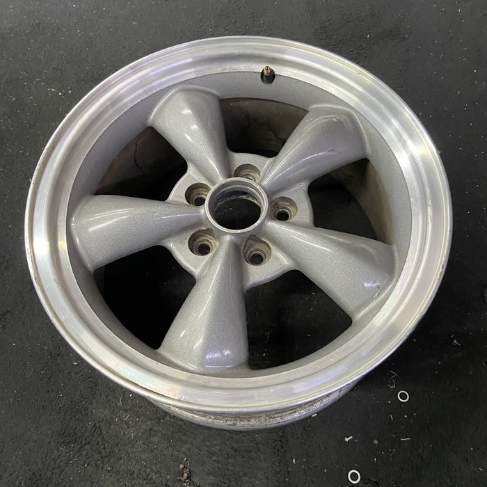 17" MUSTANG 00 17x8, , w/exposed lug nuts, funnel spoke Original OEM Wheel Rim - Close-Up Detail
