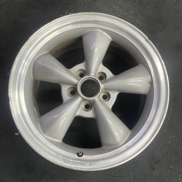 17" MUSTANG 00 17x8, , w/exposed lug nuts, funnel spoke Original OEM Wheel Rim - Angle View