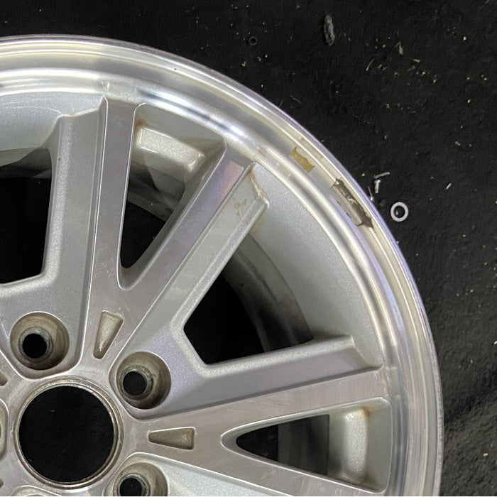 16" MUSTANG 05 16x7 5 split spoke aluminum bright pockets Original OEM Wheel Rim - Close-Up Detail