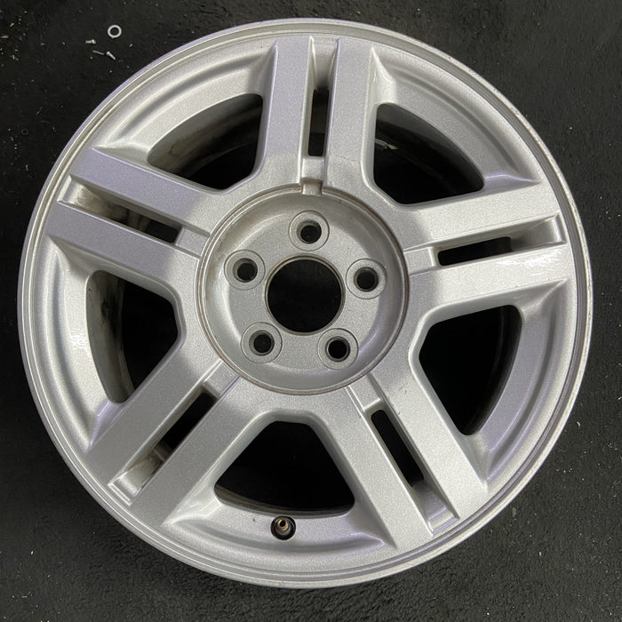 16" WINDSTAR 01-03 16x6.5 , 5 twin spokes Original OEM Wheel Rim - Angle View