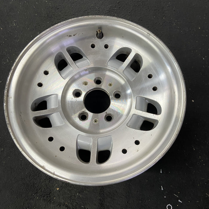 15" EXPLORER 93-94 15x7, aluminum, 10 depressions 10 holes Original OEM Wheel - Close-Up Detail