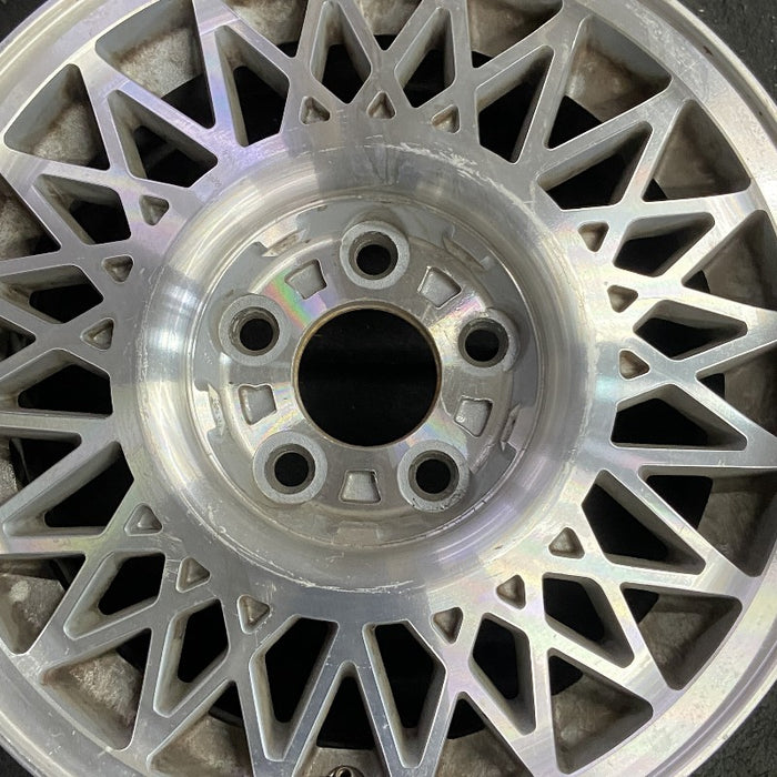 15" SABLE 86-90 15x6 aluminum bright finish Original OEM Wheel Rim - Angle View