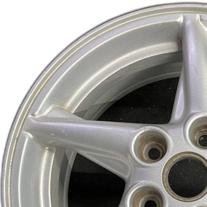 16" GRAND PRIX 99 16x6.5 aluminum 5 spoke off-set sparkle silver Original OEM - Angle View