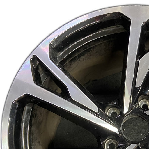 20" E-TRON GT 22-24 20x11 machined face with black pockets Original OEM Wheel - Angle View