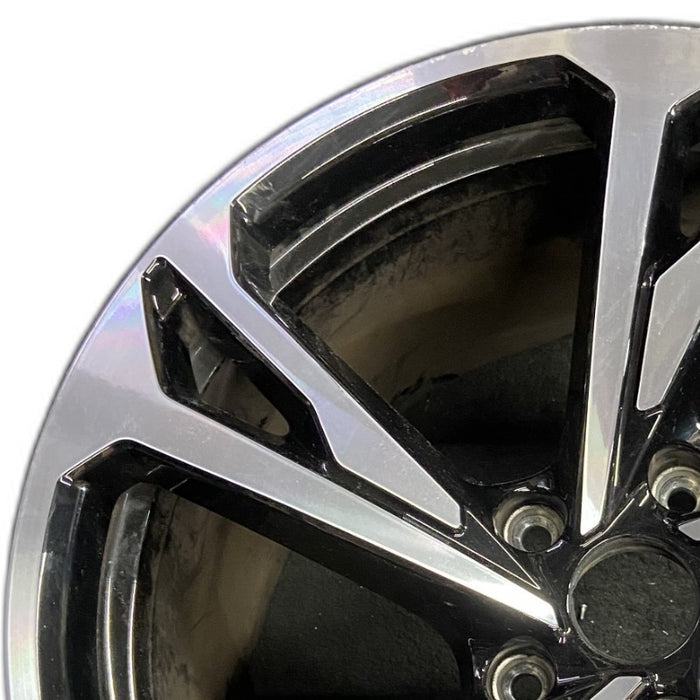 20" E-TRON GT 22-24 20x11 machined face with black pockets Original OEM Wheel - Angle View