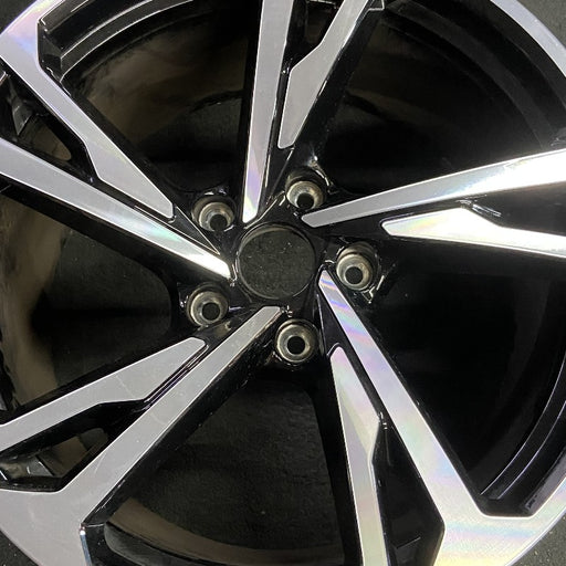 20" E-TRON GT 22-24 20x11 machined face with black pockets Original OEM Wheel - Angle View