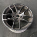 18" PORSCHE BOXSTER 17-25 18x9.5, , triangle spoke Original OEM Wheel Rim - Close-Up Detail