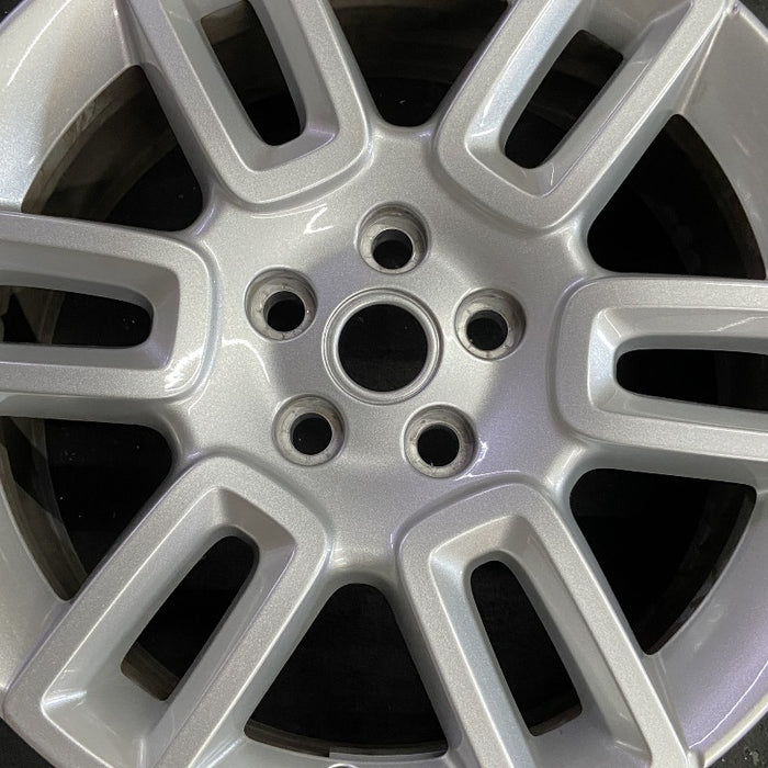 19" DEFENDER 20-22 19x8 6 spoke straight spoke silver Original OEM Wheel Rim - Angle View