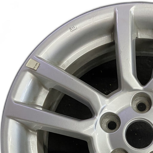 16" SONIC 12-16 16x6 silver Original OEM Wheel Rim - Angle View