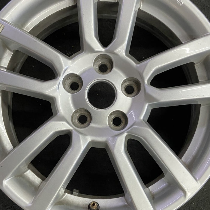 16" SONIC 12-16 16x6 silver Original OEM Wheel Rim - Angle View