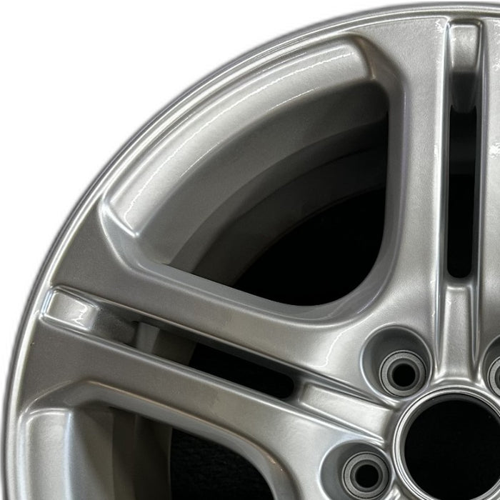 18" TL 04-05 18x8 alloy silver Original OEM Wheel Rim - Angle View