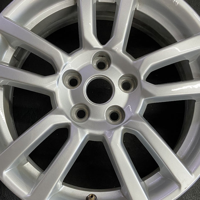 16" SONIC 12-16 16x6 silver Original OEM Wheel Rim - Angle View