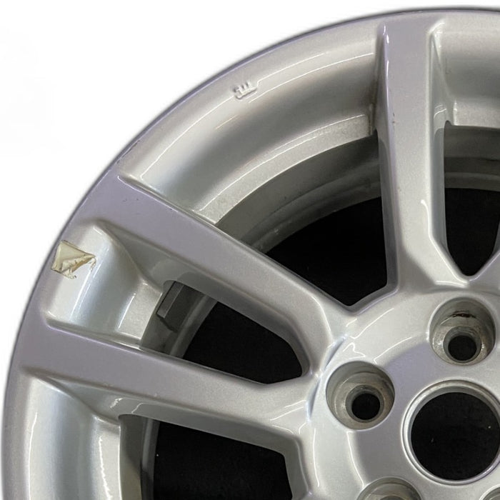 16" SONIC 12-16 16x6 silver Original OEM Wheel Rim - Angle View