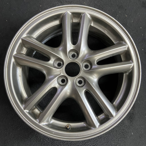 16" IMPREZA 04-05 16x6.5 , 10 spoke, peaked spoke Original OEM Wheel Rim - Angle View