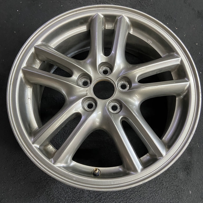 16" IMPREZA 04-05 16x6.5 , 10 spoke, peaked spoke Original OEM Wheel Rim - Side Profile