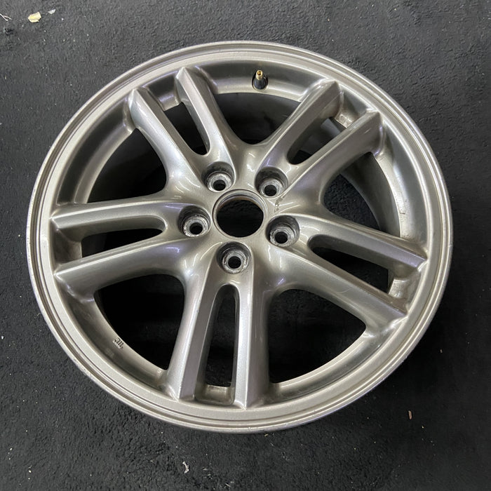 16" IMPREZA 04-05 16x6.5 , 10 spoke, peaked spoke Original OEM Wheel Rim - Close-Up Detail