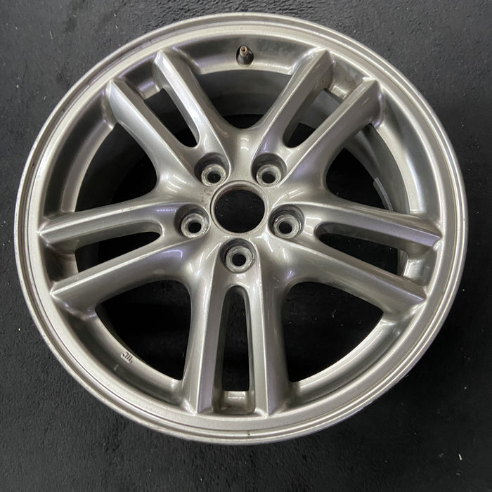 16" IMPREZA 04-05 16x6.5 , 10 spoke, peaked spoke Original OEM Wheel Rim - Close-Up Detail