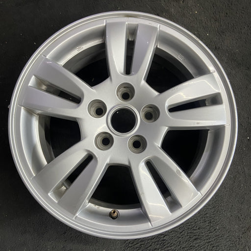 15" SONIC 12-16 15x6, aluminum Original OEM Wheel Rim - Angle View