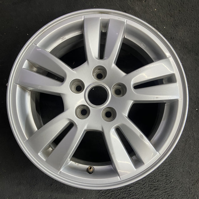 15" SONIC 12-16 15x6, aluminum Original OEM Wheel Rim - Angle View